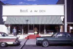 Author Brian Patton stands in front of the original Banff Book & Art Den, 1968.