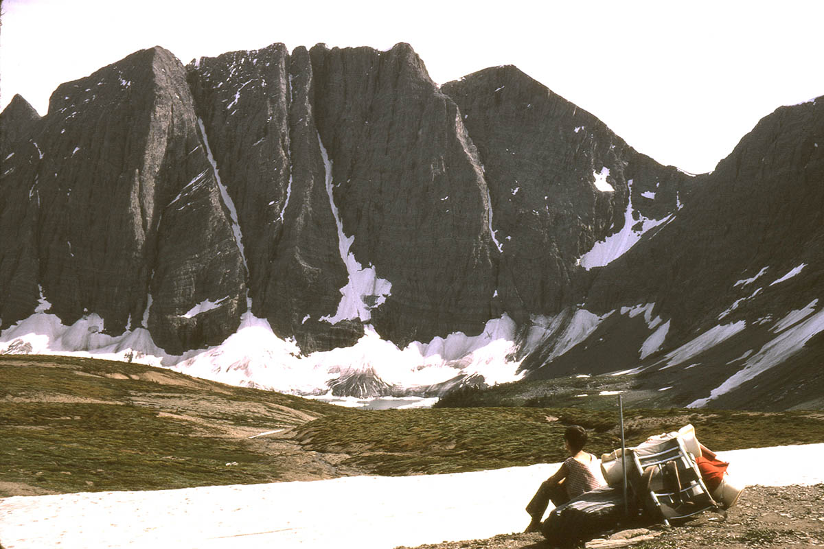 As snow melted out in the high country, we headed off to measure and photograph the Rockwall Trail. Floe Lake from Numa Pass on July 6, 1970.