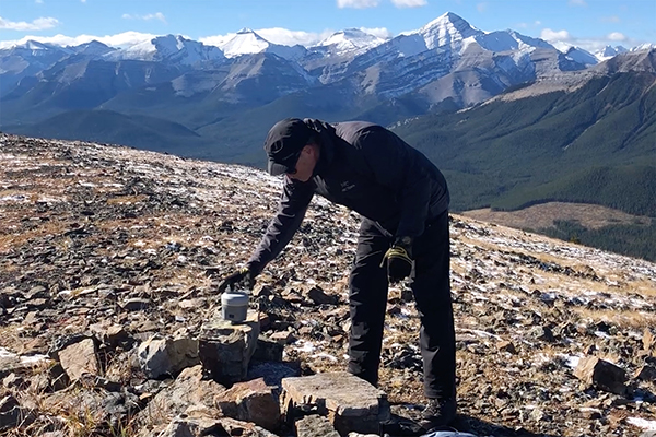 Dr. Gerard Lachapelle places a GNSS receiver on Powderface Ridge west of Elbow Falls in Kananaskis Country. These super-sensitive units are fine-tuning elevations in the Canadian Rockies. Photo courtesy of Gerard Lachapelle.