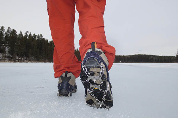 Yours truly in his Hillsound Trail Crampon Ultras hiking across a frozen lake mid-March in the Purcell Range foothills.